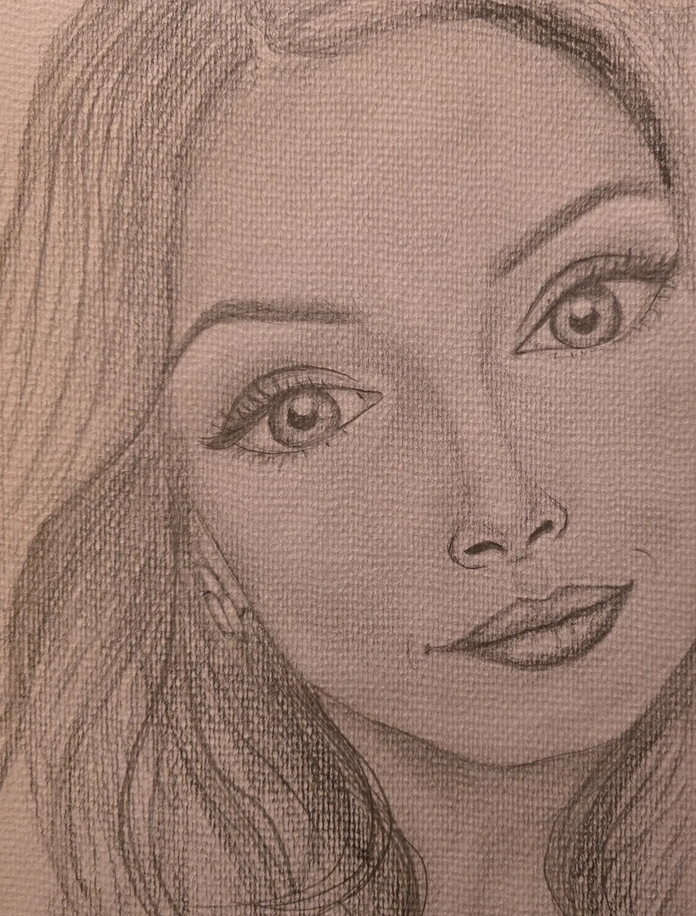 A pencil portrait drawn on textured paper.
