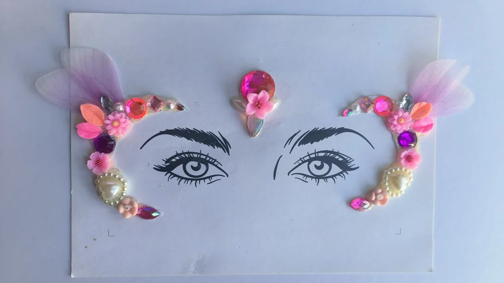 Colourful decorative eye pieces with flowers, jewels and painted details.